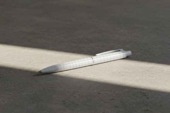 Download Elegant Pen on Concrete Floor Mockup - Mock Collection